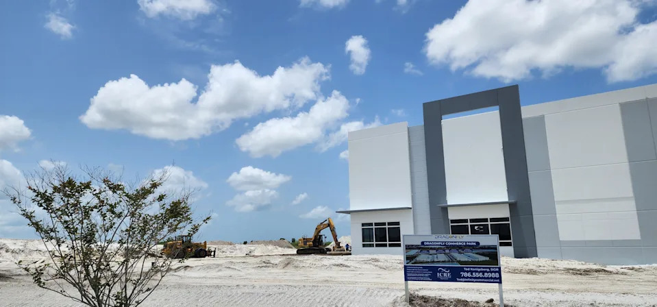 Dragonfly Commerce Park aerial view — 407,000 SF Class A industrial park under construction in Port St. Lucie, Florida